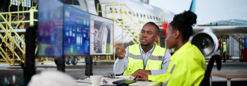 aerospace engineers on a computer